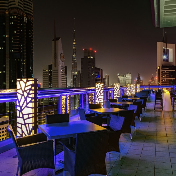 Chef presenting a dish at Level 43 Sky Lounge Restaurants in Dubai
