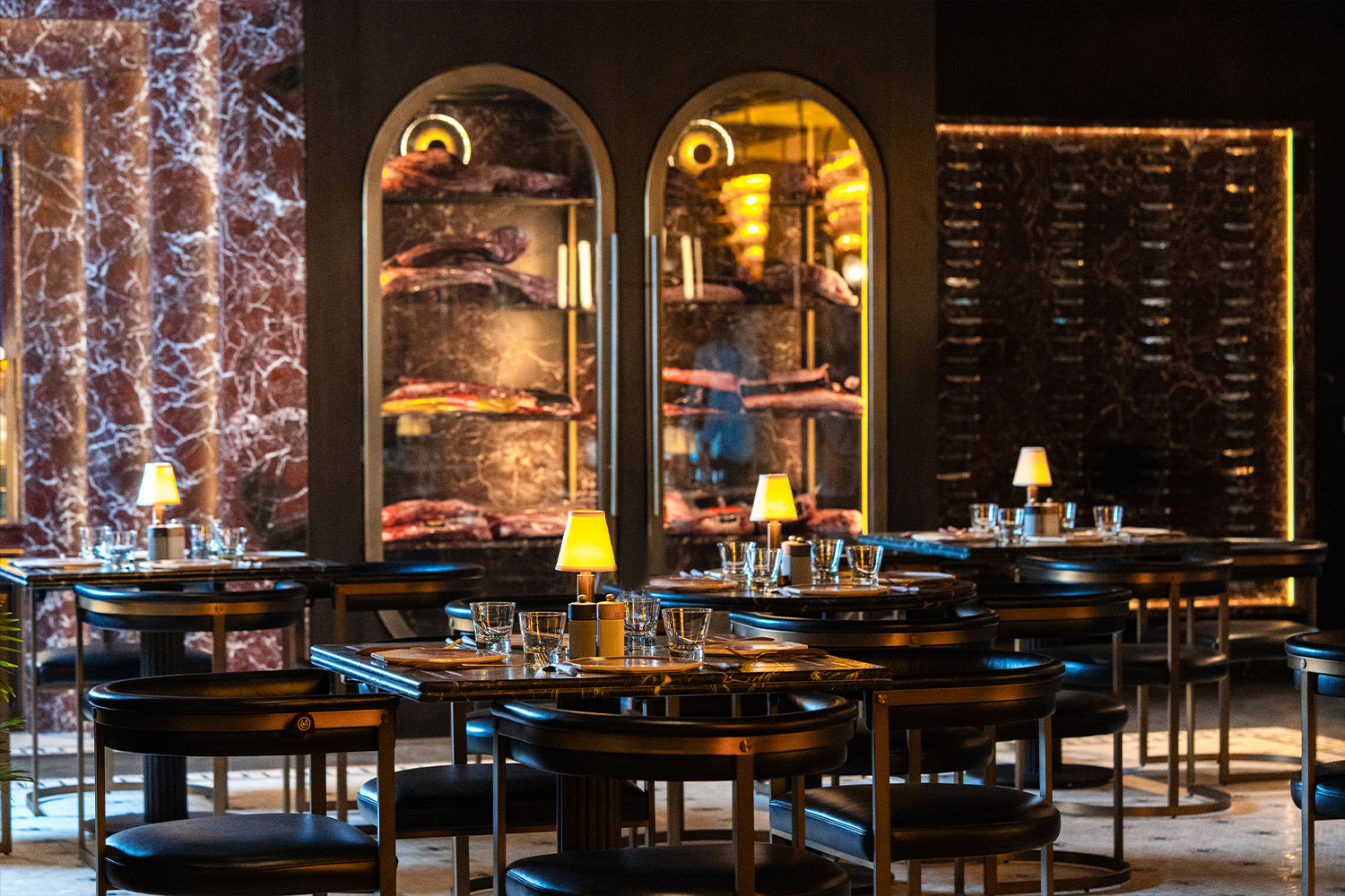 Chef preparing dish at The Meat Co Restaurants in Dubai