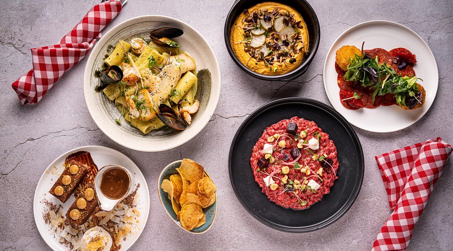 Elegant dining setup at The Scene by Simon Rimmer Restaurants in Dubai